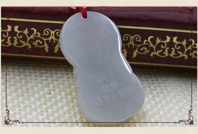 Gold inlaid jade pendant