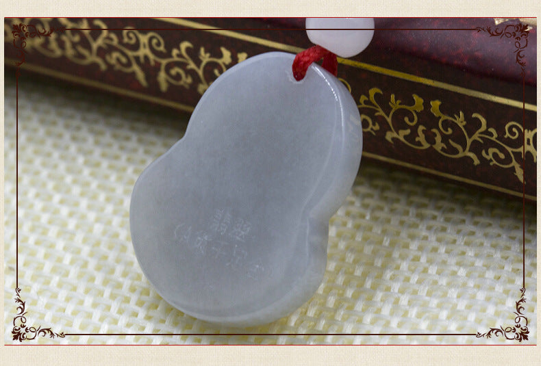 Gold inlaid jade pendant